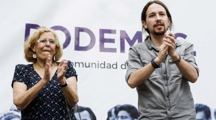 Manuela Carmena en un acto de Podemos junto a Pablo Iglesias