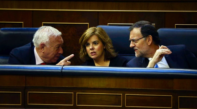García Margallo, Soraya y Mariano Rajoy, durante un pleno en el Congreso.