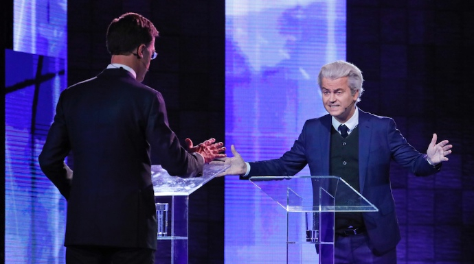 El primer ministro Mark Rutte y el candidato islamófobo, Geert Wilders. Están empatados en las encuestas.