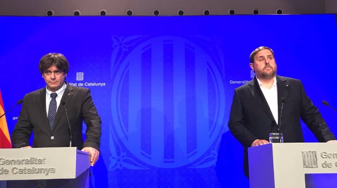 Puigdemon y Junqueras, este martes, en su improvisada comparecencia ante los periodistas.