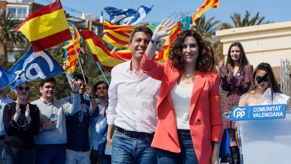La presidenta de la Comunidad de Madrid, Isabel Díaz Ayuso, y el presidente del PP de la Comunidad valenciana, Carlos Mazón.