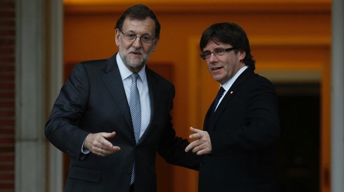Rajoy y el presidente catalán, Carled Puigdemont, durante su última entrevista en La Moncloa