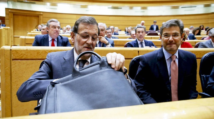 Rajoy, junto a su ministro de Justicia, Rafael Catalá