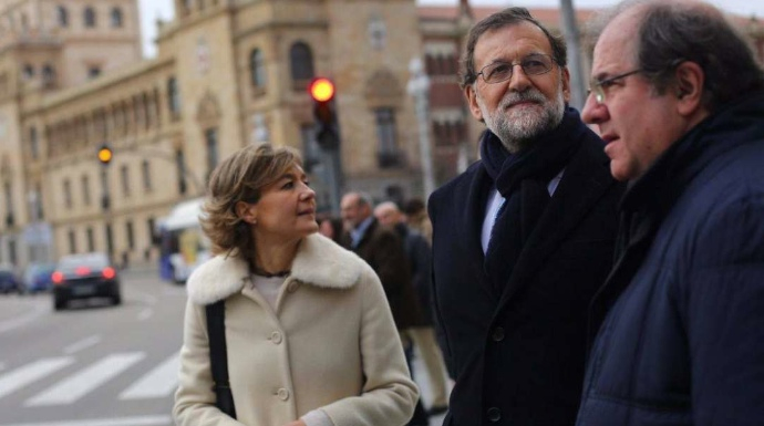 La ministra de Agricultura, junto a Rajoy y el presidente de Castilla-León