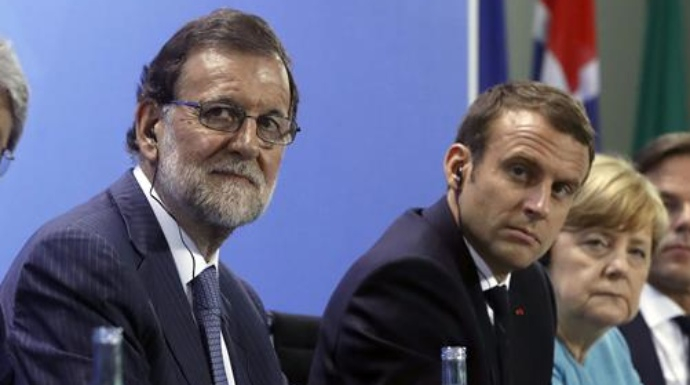 Rajoy, junto a Macrón y Merkel.