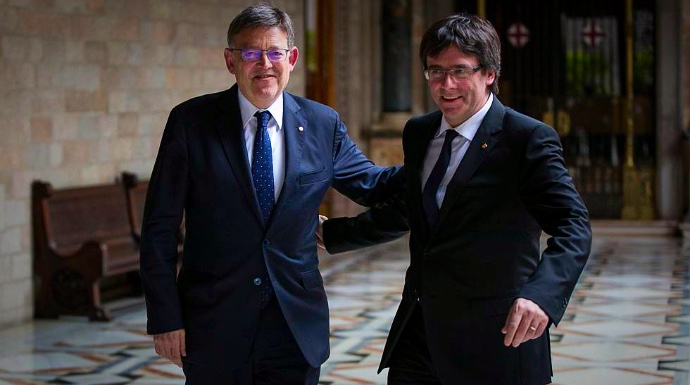 Ximo Puig y Carles Puigdemont, en un encuentro en Valencia.
