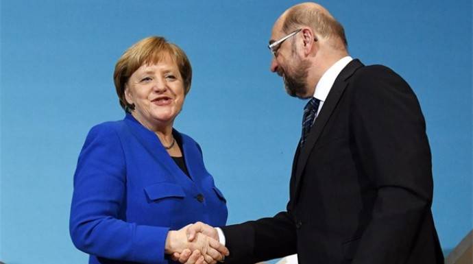 Merkel y Schulz, en una imagen que simboliza su probable acuerdo
