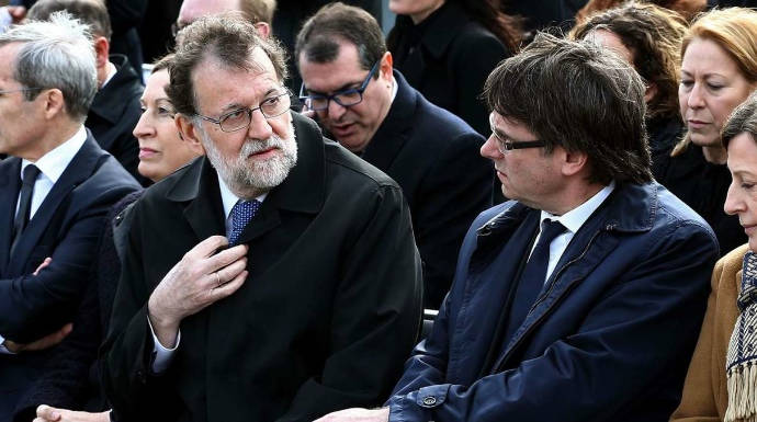 Rajoy y Puigdemont, en un acto antes del 1-0.