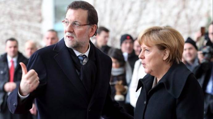 Rajoy charla con Merkel.