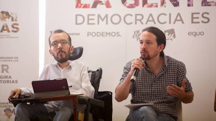 Echenique e Iglesias, durante el acto en el que persiguieron a Aznar