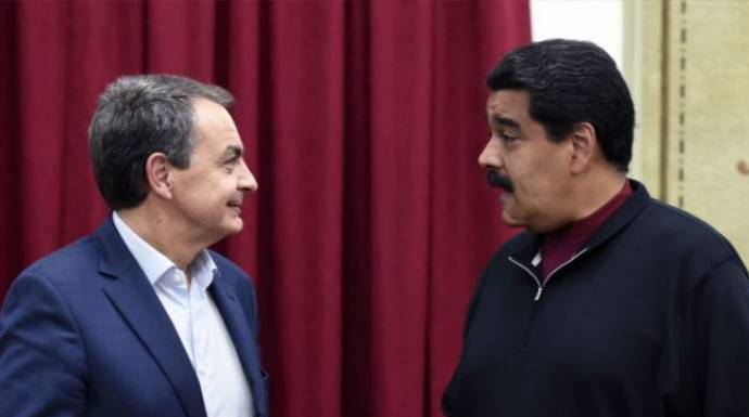 Zapatero y Maduro, sonrientes, en una de sus reuniones en Caracas.