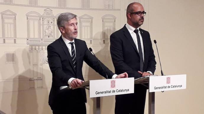 El ministro del Interior, Fernando Grande-Marlaska, en una comparecencia junto al conseller catalán, Miquel Buch.