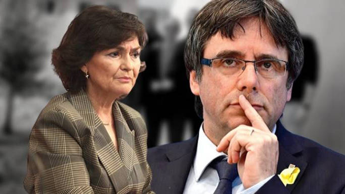 Puigdemont y Carmen Calvo, con los condenados del procés detrás