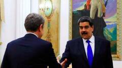 Zapatero saluda a Maduro en una de sus visitas a Caracas.