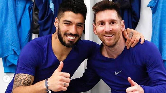 Suárez y Messi, en el vestuario del Fútbol Club Barcelona. 