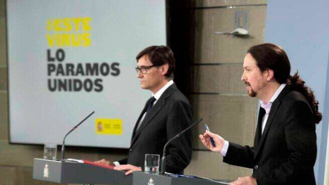 Salvador Illa y Pablo Iglesias, en una rueda de prensa en Moncloa