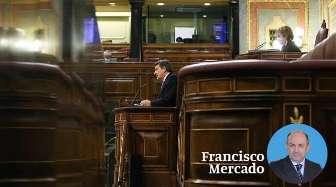 El ministro José Luis Escrivá, este miércoles en la tribuna del Congreso de los Diputados.