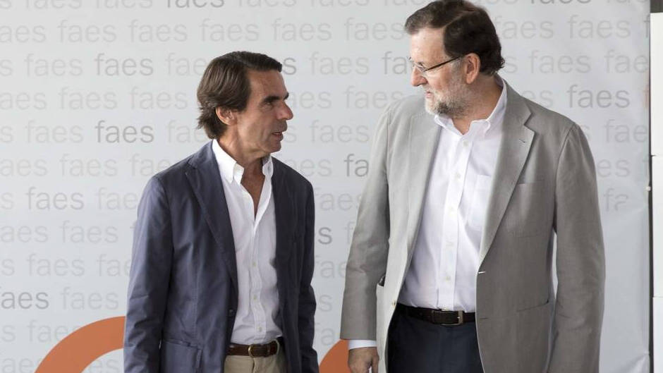 Los expresidente del Gobierno de España y del PP, José María Aznar y Mariano Rajoy.