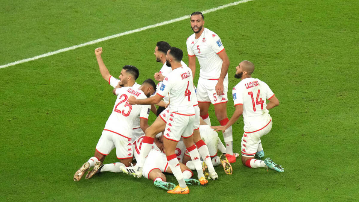 Los jugadores de Túnez celebran su gol ante Francia.