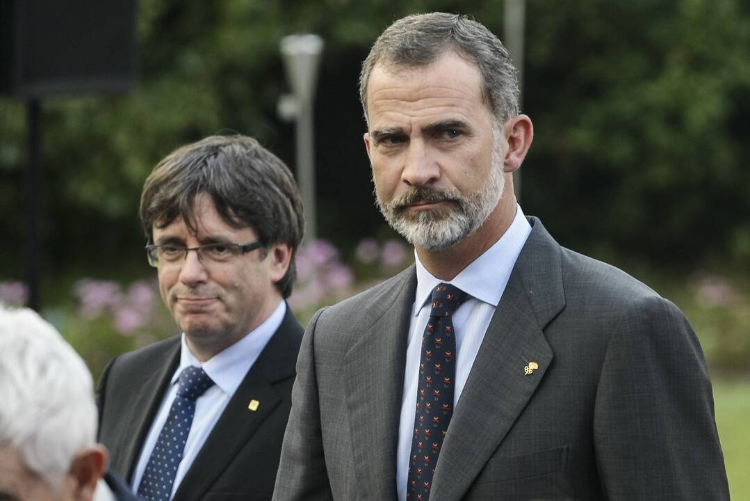 Puigdemont y el Rey Felipe VI.