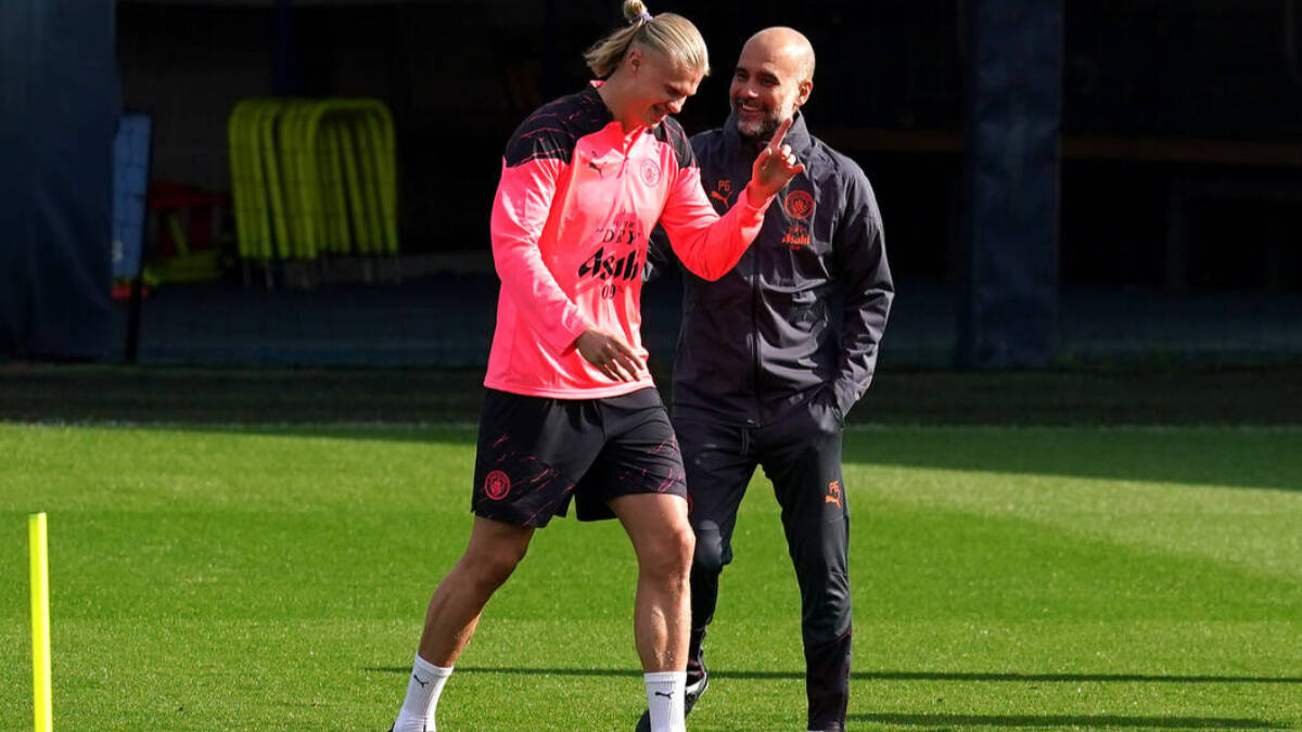 Haaland y Guardiola durante un entrenamiento del City.